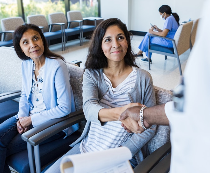 Women meeting physician