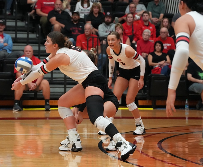 Women playing volleyball