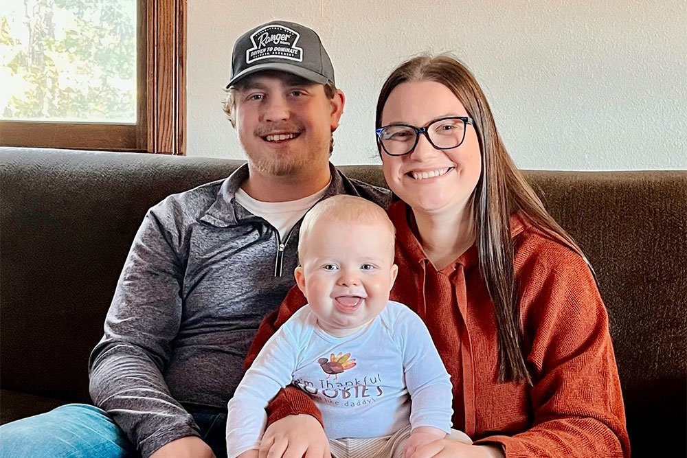 photo of Brittany Freese with her husband and son