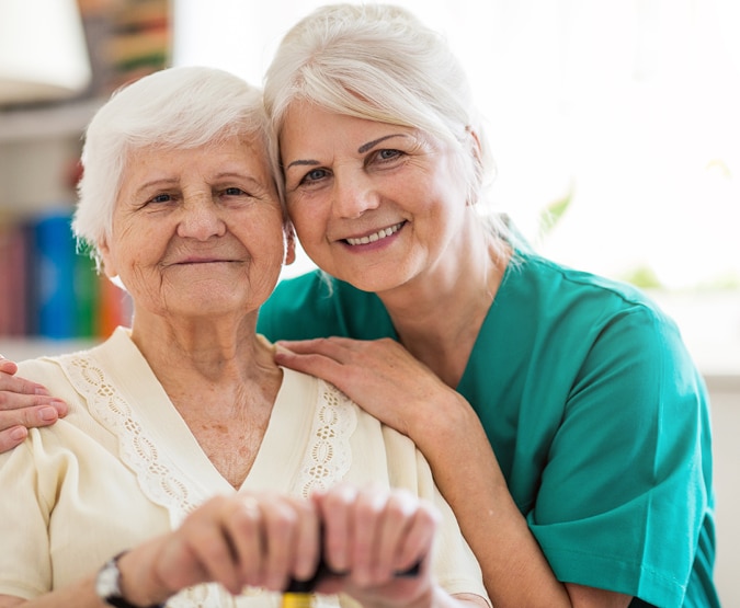 older woman with hospice provider