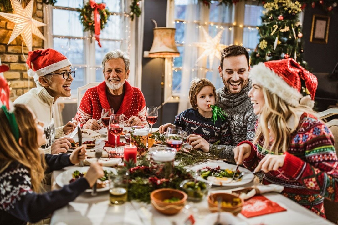 photo of a family gathering for dinner during holiday season