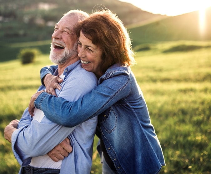 Older couple embracing