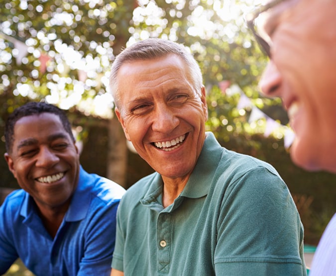 Three men talking