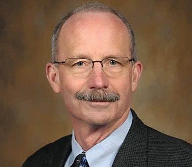 Mark E. Johnson