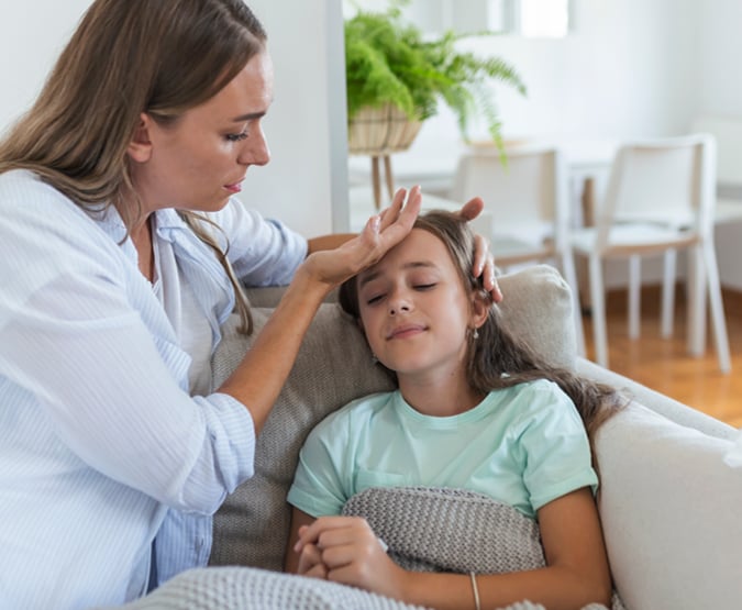 Mom and sick daughter