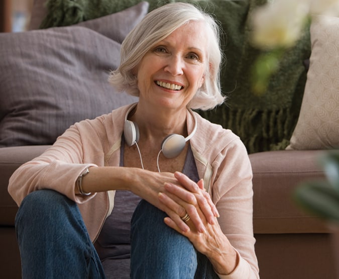 Older woman with headphones