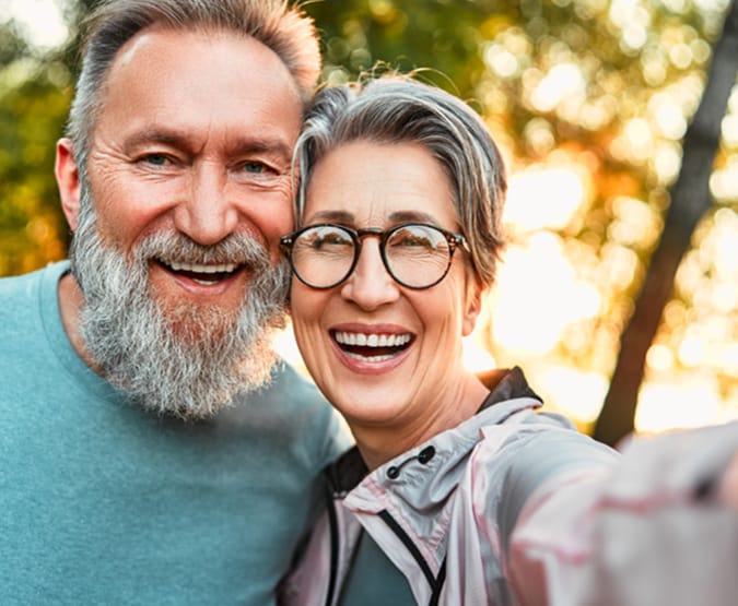 Older couple taking selfie