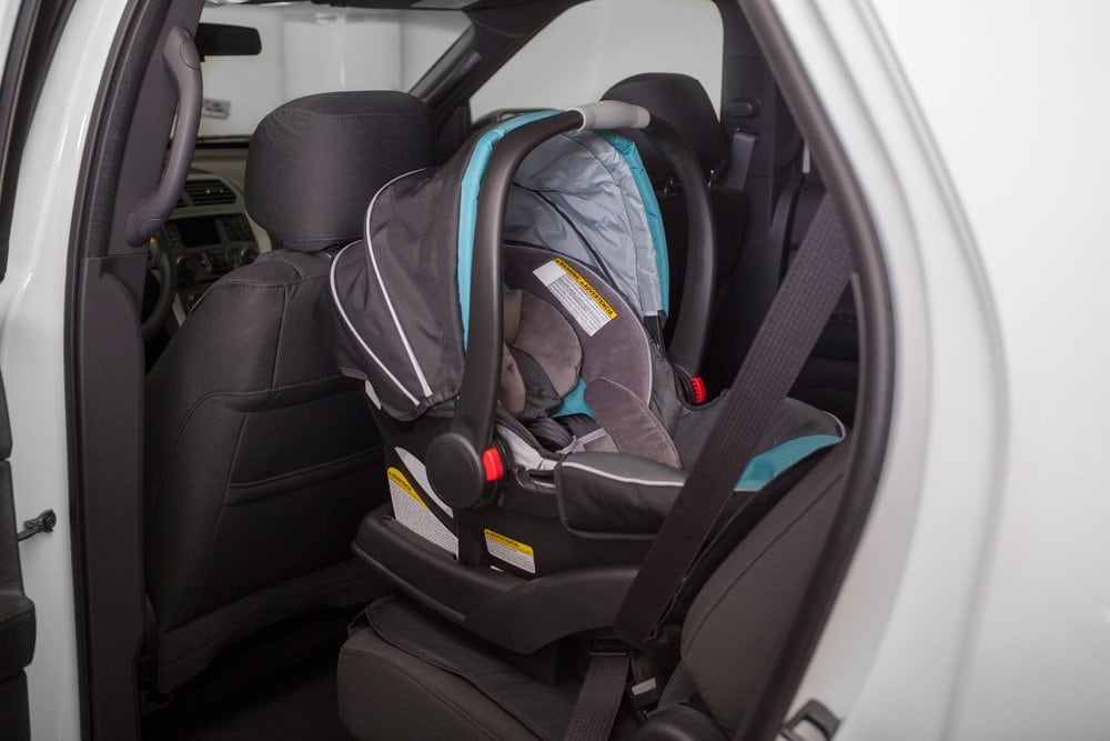 stock photo of a child car seat inside a car