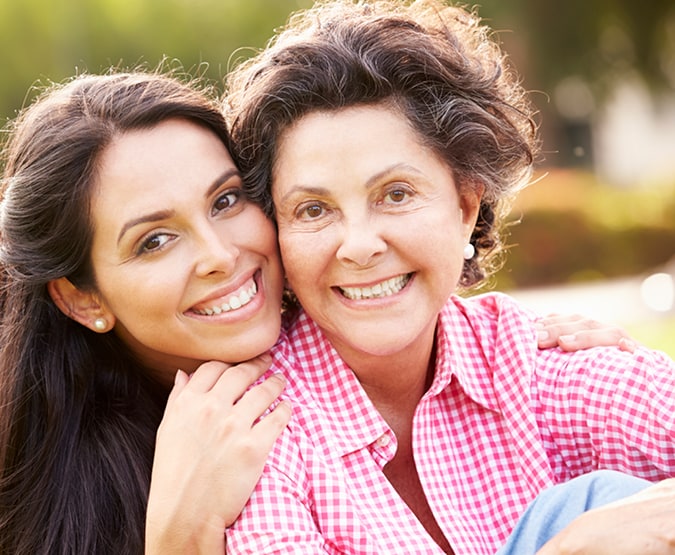 Two women embracing