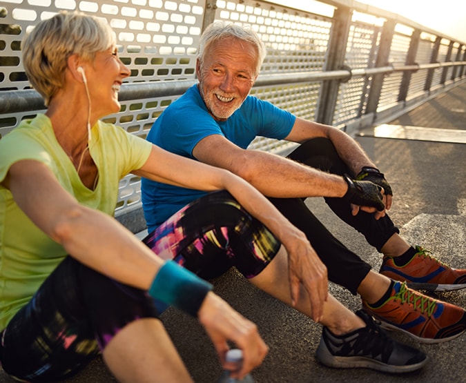 Older couple resting after exercise